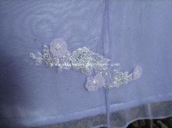 Silk satin and tulle gown - applique and hem detail