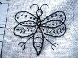Hand embroidered blackwork bee