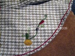 Early medieval hand embroidered hood - close up detail