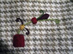 Early medieval hand embroidered hood - close up detail