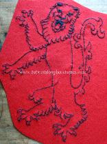 Cut out badge with hand embroidered detail (before cutting out)